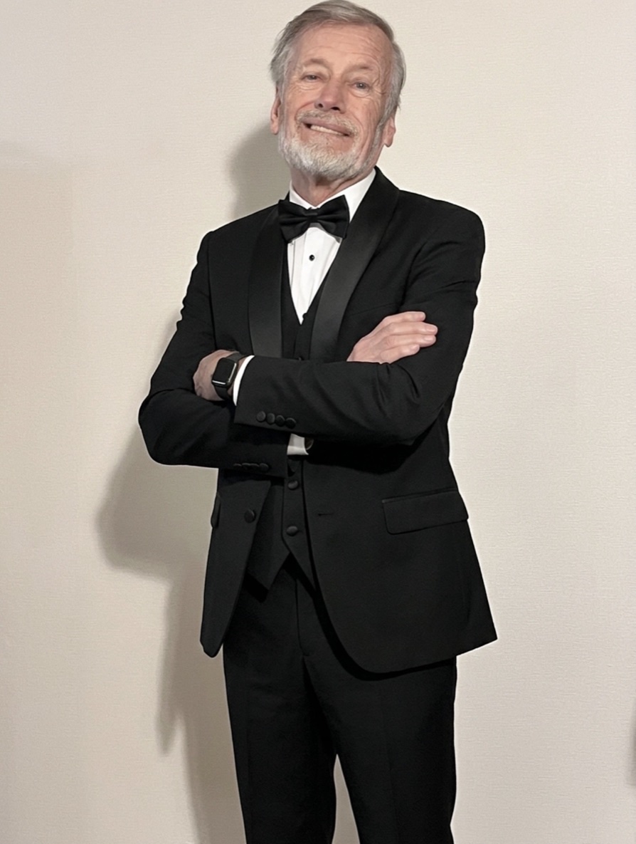 Troy Milligan in a tuxedo